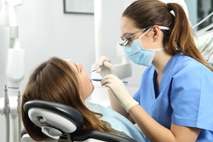 Dental hygienist doing a cleaning