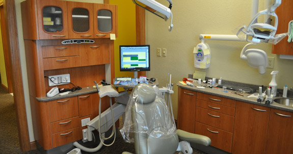 Dental examination chair and treatment room