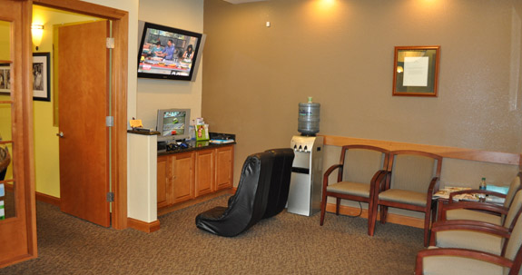Reception area with chairs and television