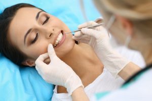 a woman visiting the dentist