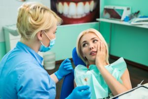 Woman at dentist for TMJ treatment